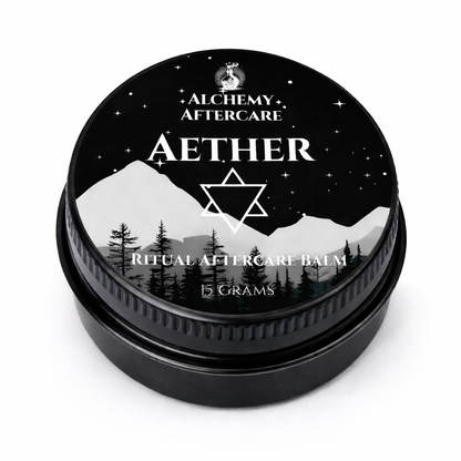 Black container of Aether Ritual Aftercare Balm with mountain and star design on lid