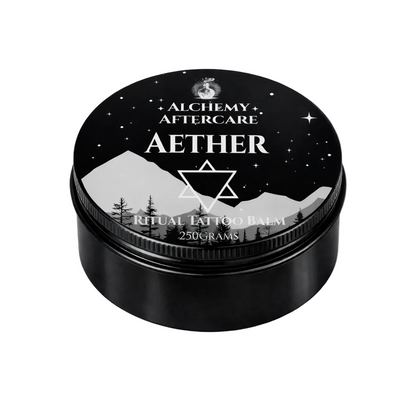 Alchemy Aftercare Aether Ritual Tattoo Balm container with mountain and star design on a white background