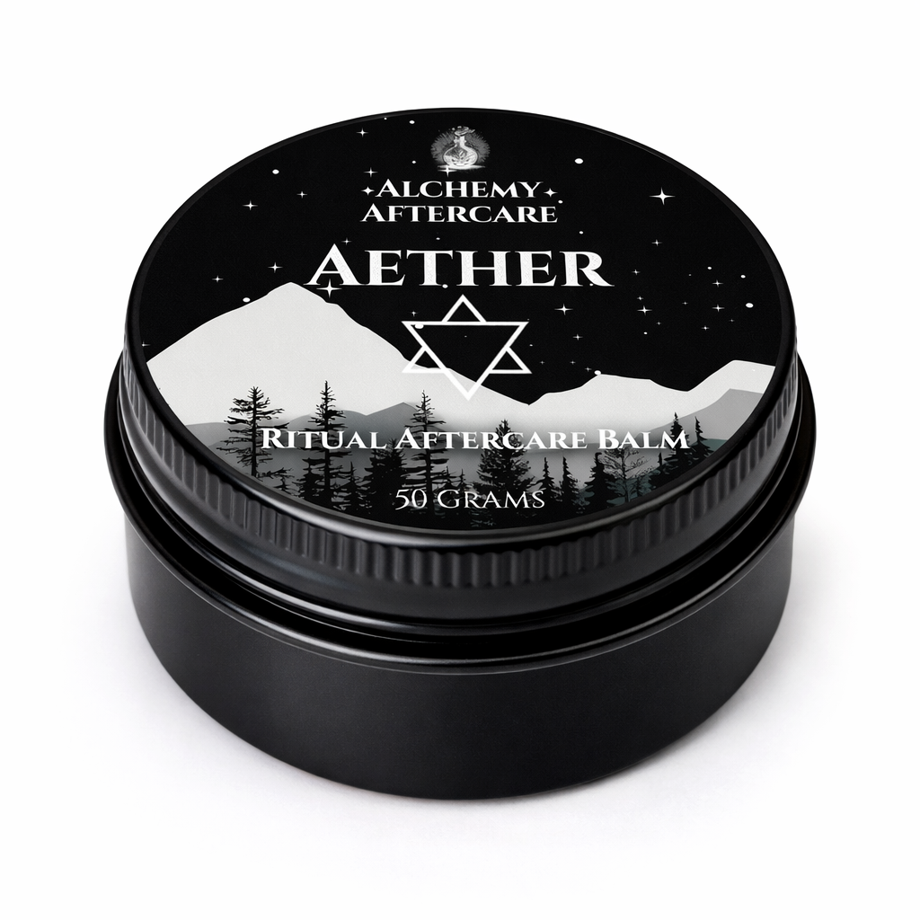 Black jar of Alchemy Aftercare Aether Ritual Aftercare Balm with mountain and star design on lid.