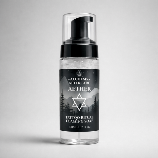 Aether Fragrance Free Tattoo Foaming Cleanser for fresh tattoos in reusable foaming bottle, grey background