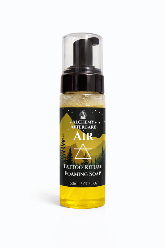 Foaming tattoo soap bottle labeled 'Air' by Alchemy Aftercare on a white background