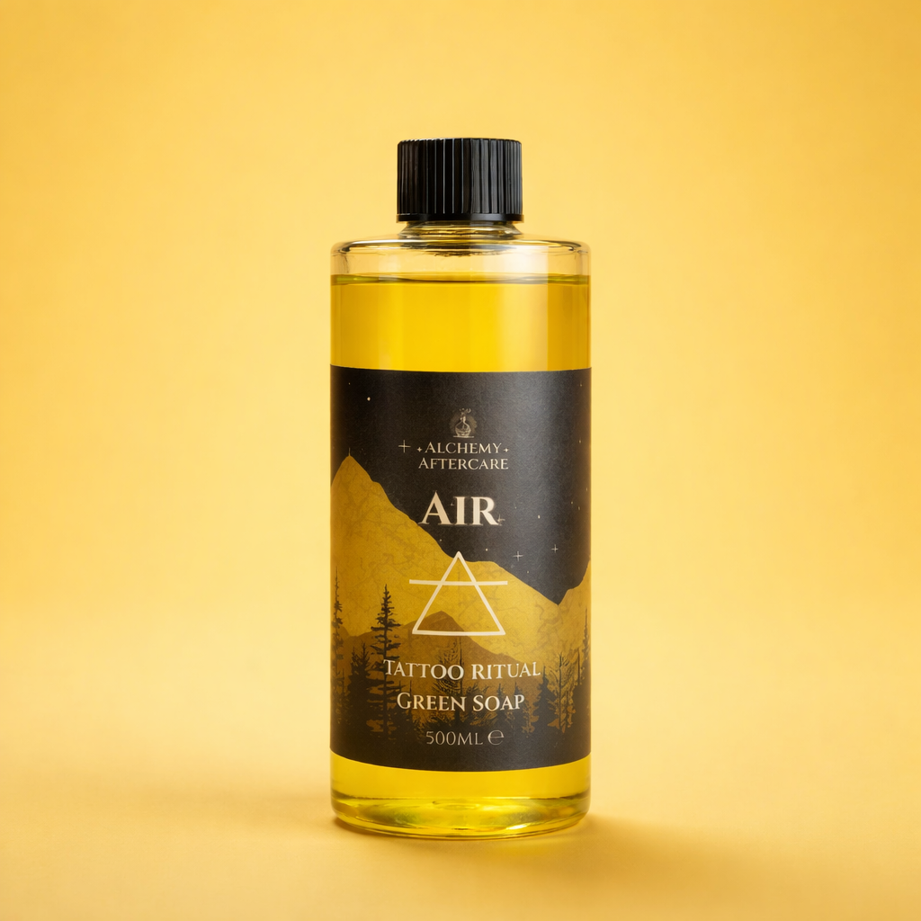 Air Green Soap Concentrate with Oatmeal, Milk & Honey fragrance for professional tattoo artists, handcrafted in Sheffield, cap, yellow background