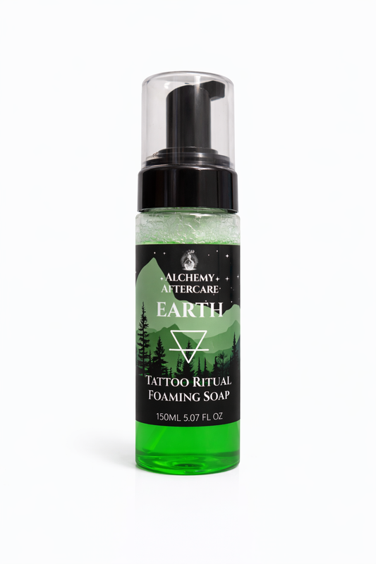 Bottle of Alchemy Aftercare Earth Tattoo Ritual Foaming Soap on a white background